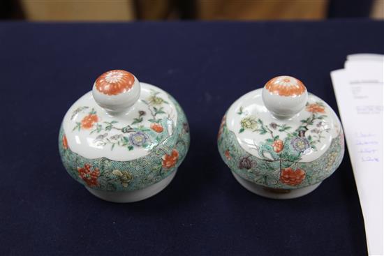 A pair of Chinese famille verte ovoid jars and covers, late 19th century, 31cm, one cover repaired